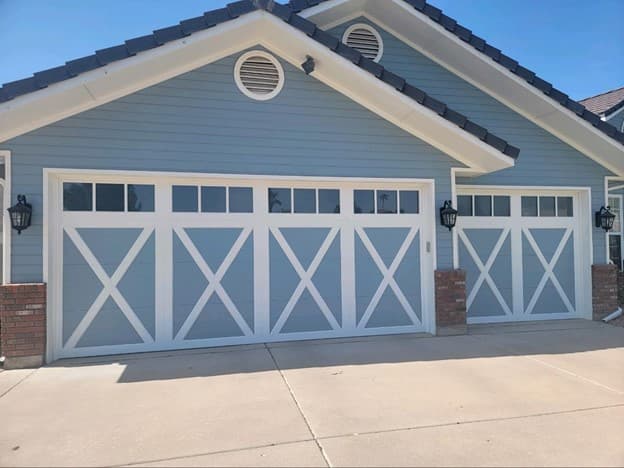 Overlay garage door panel design