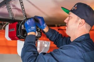garage door professional repairing garage door motor